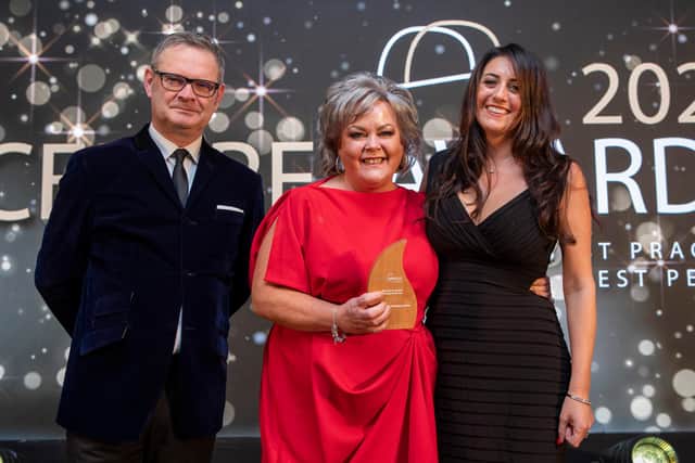 Debbie Hernon (centre) of Charter Walk Shopping Centre Burnley at this year's SCEPTRE awards in London