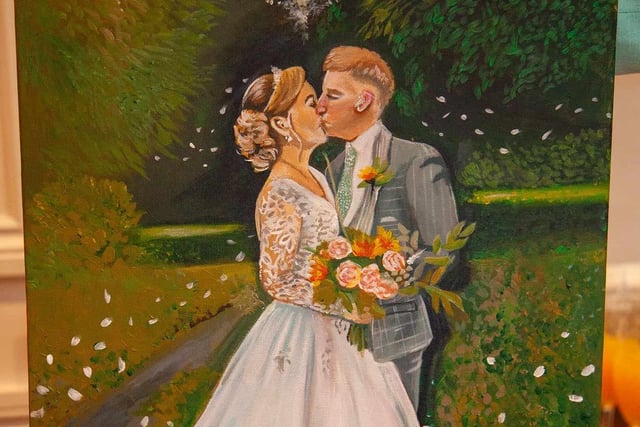 This canvas of Layla Boult and Lee Ormerod is by Stevie-Leigh Gough who painted it during their wedding reception
