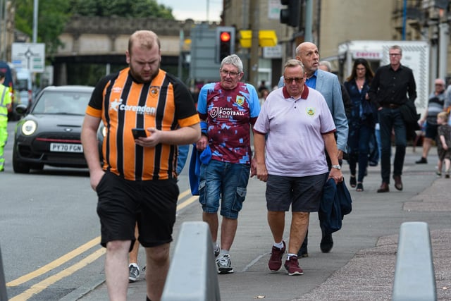 Burnley fans arrive at Turf Moor ahead of the game against Hull City. Photo: Kelvin Stuttard