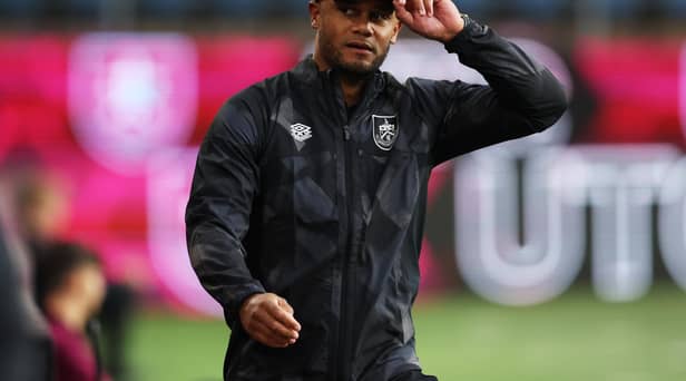 BURNLEY, ENGLAND - AUGUST 16: Vincent Kompany, Manager of Burnley walks out prior to  the Sky Bet Championship between Burnley and Hull City at Turf Moor on August 16, 2022 in Burnley, England. (Photo by Clive Brunskill/Getty Images)