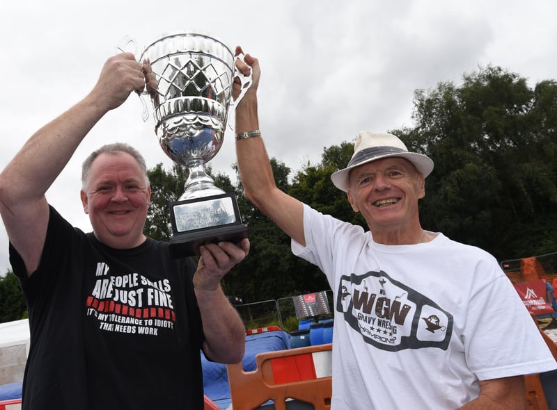 Landlord Jon Lowe and part of the organising team Ken Claxon, right, with the trophy