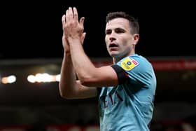 STOKE ON TRENT, ENGLAND - DECEMBER 30: Josh Cullen of Burnley applauds fans following their sides victory after the Sky Bet Championship match between Stoke City and Burnley at Bet365 Stadium on December 30, 2022 in Stoke on Trent, England. (Photo by Charlotte Tattersall/Getty Images)