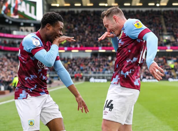 Burnley's Connor Roberts celebrates scoring his side's second goal with Nathan Tella

The EFL Sky Bet Championship - Burnley v Huddersfield Town - Saturday 25th February 2023 - Turf Moor - Burnley