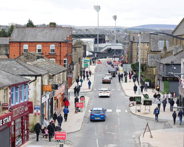 BURNLEY, ENGLAND - MARCH 16: General view as fans make their way to the stadium prior to the Premier League match between Burnley FC and Brentford FC at Turf Moor on March 16, 2024 in Burnley, England. (Photo by Matt McNulty/Getty Images)