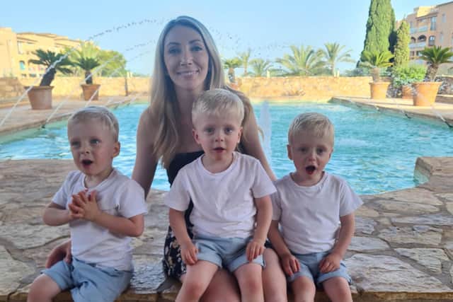 Tanya with triplets Rupert, Austin and Ethan.