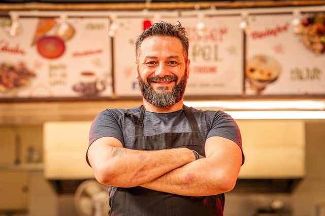 From painting benches in Thompson Park to running his own business,  Ousama Abdallah - otherwise known as Mr Falafel - in  Burnley Market,