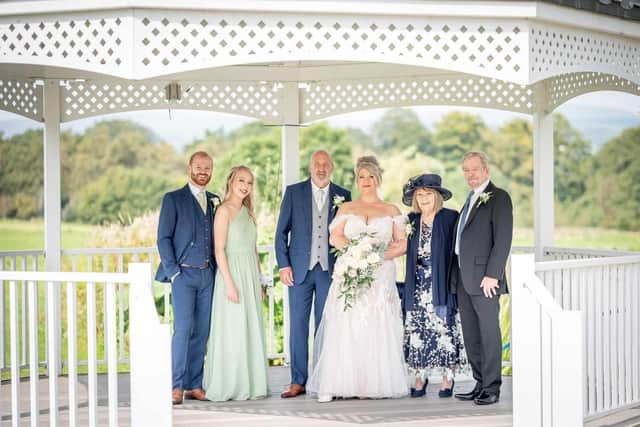 Wedding day happiness complete for bride and groom Lisa and Stephen Dickinson with Lisa's parents, Colin and Olive Newton, and Lisa's son Daniel and his partner Rachel
