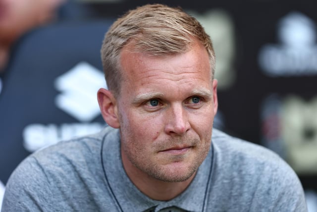 MILTON KEYNES, ENGLAND - MAY 08: Liam Manning, Manager of Milton Keynes Dons, looks on prior to kick off of the Sky Bet League One Play-Off Semi Final 2nd Leg match between Milton Keynes Dons and at Stadium mk on May 08, 2022 in Milton Keynes, England. (Photo by Marc Atkins/Getty Images)