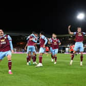 LUTON, ENGLAND - OCTOBER 03: Jacob Bruun Larsen of Burnley (obscured) celebrates with teammates after scoring the team's second goal during the Premier League match between Luton Town and Burnley FC at Kenilworth Road on October 03, 2023 in Luton, England. (Photo by Marc Atkins/Getty Images)