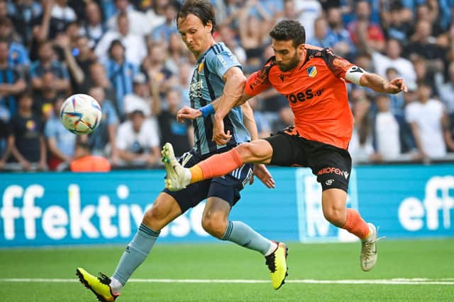 Djurgardens' Swedish defender Hjalmar Ekdal (L) and Apoel's Cypriot midfielder George Efrem vie for the ball during the UEFA Conference League Play-offs first leg soccer match between Djurgardens IF and Apoel Nicosia FC  in Stockholm, Sweden, on August 17, 2022. Sweden OUT (Photo by FREDRIK SANDBERG/TT News Agency/AFP via Getty Images)
