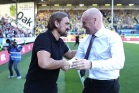 Daniel Farke, Manager of Norwich City shakes hands with Sean Dyche, Manager of Burnley. (Photo by Alex Morton/Getty Images)