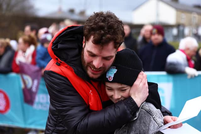 A hero's welcome from a young fan after Jordan landed in Burnley