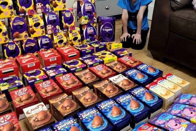 George with his amazing haul of Easter eggs for young hospital patients