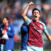 BURNLEY, ENGLAND - APRIL 24: Jack Cork of Burnley celebrates after their sides victory during the Premier League match between Burnley and Wolverhampton Wanderers at Turf Moor on April 24, 2022 in Burnley, England. (Photo by Gareth Copley/Getty Images)
