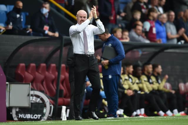 BURNLEY, ENGLAND - AUGUST 14: Sean Dyche, Manager of Burnley applauds the fans prior to the Premier League match between Burnley and Brighton & Hove Albion at Turf Moor on August 14, 2021 in Burnley, England. (Photo by Nathan Stirk/Getty Images)