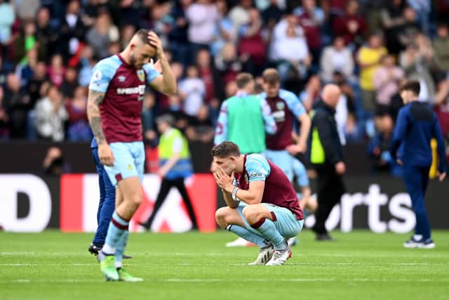 BURNLEY, ENGLAND - MAY 22: James Tarkowski of Burnley looks dejected following defeat and relegation to the Sky Bet Championship following  the Premier League match between Burnley and Newcastle United at Turf Moor on May 22, 2022 in Burnley, England. (Photo by Gareth Copley/Getty Images)