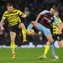 BURNLEY, ENGLAND - FEBRUARY 05: Dale Stephens of Burnley battles for possession with Juraj Kucka of Watford FC during the Premier League match between Burnley and Watford at Turf Moor on February 05, 2022 in Burnley, England. (Photo by James Gill/Getty Images)