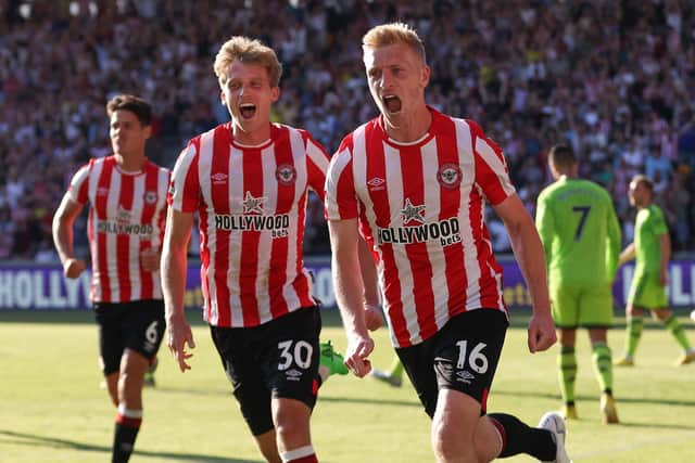 BRENTFORD, ENGLAND - AUGUST 13: Ben Mee of Brentford celebrates after scoring their sides third goal during the Premier League match between Brentford FC and Manchester United at Brentford Community Stadium on August 13, 2022 in Brentford, England. (Photo by Catherine Ivill/Getty Images)