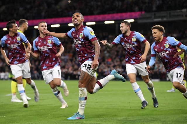 BURNLEY, ENGLAND - AUGUST 30: Vitinho of Burnley celebrates after scoring their team's first goal during the Sky Bet Championship between Burnley and Millwall at Turf Moor on August 30, 2022 in Burnley, England. (Photo by Alex Livesey/Getty Images)