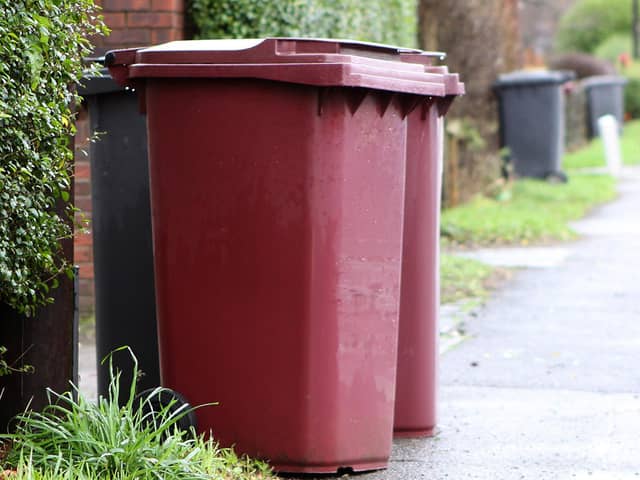 A Burnley dad is calling for weekly bin collections to be reintroduced