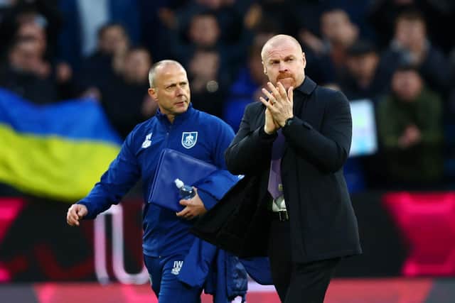 BURNLEY, ENGLAND - APRIL 06: Sean Dyche, Manager of Burnley applauds fans prior to the Premier League match between Burnley and Everton at Turf Moor on April 06, 2022 in Burnley, England. (Photo by Clive Brunskill/Getty Images)