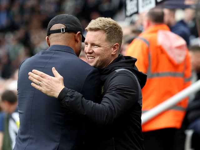 NEWCASTLE UPON TYNE, ENGLAND - SEPTEMBER 30:  Vincent Kompany, Manager of Burnley, embraces Eddie Howe, Manager of Newcastle United, prior to the Premier League match between Newcastle United and Burnley FC at St. James Park on September 30, 2023 in Newcastle upon Tyne, England. (Photo by Ian MacNicol/Getty Images)