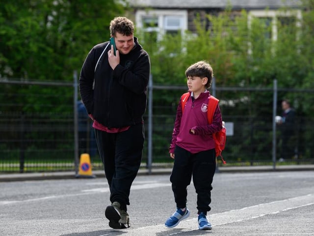 Burnley fans arrive at Turf Moor for the Premier League fixture against Brighton and Hove Albion. Photo: Kelvin Lister-Stuttard