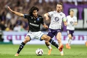 Auxerre's French midfielder Han-Noah Massengo (L) fights for the ball with Toulouse's Belgian midfielder Brecht Dejaegere (R) during the French L1 football match between Toulouse FC and AJ Auxerre at The TFC Stadium in Toulouse, southwestern France, on May 27, 2023. (Photo by Charly TRIBALLEAU / AFP) (Photo by CHARLY TRIBALLEAU/AFP via Getty Images)