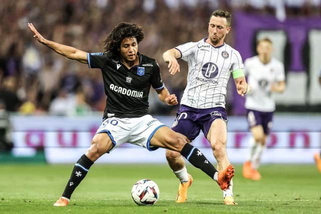 Auxerre's French midfielder Han-Noah Massengo (L) fights for the ball with Toulouse's Belgian midfielder Brecht Dejaegere (R) during the French L1 football match between Toulouse FC and AJ Auxerre at The TFC Stadium in Toulouse, southwestern France, on May 27, 2023. (Photo by Charly TRIBALLEAU / AFP) (Photo by CHARLY TRIBALLEAU/AFP via Getty Images)