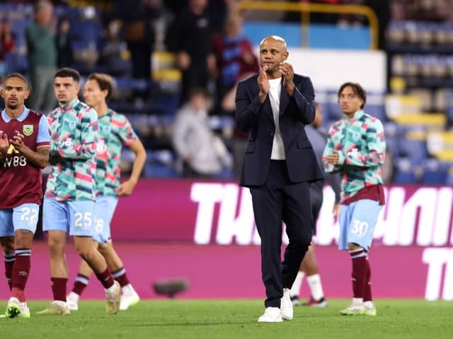 BURNLEY, ENGLAND - AUGUST 11: Vincent Kompany, Manager of Burnley, applauds the fans after the team's defeat in the Premier League match between Burnley FC and Manchester City at Turf Moor on August 11, 2023 in Burnley, England. (Photo by Nathan Stirk/Getty Images)