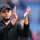 BURNLEY, ENGLAND - MARCH 16: Vincent Kompany, Manager of Burnley, acknowledges the fans after the Premier League match between Burnley FC and Brentford FC at Turf Moor on March 16, 2024 in Burnley, England. (Photo by Matt McNulty/Getty Images)