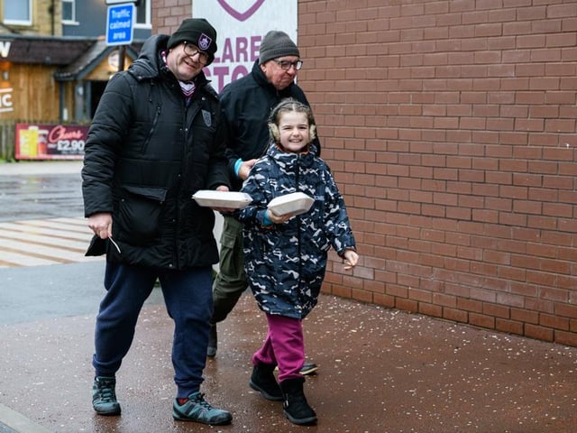 Burnley fans arrive at Turf Moor for the Premier League fixture against West Ham United. Photo: Kelvin Lister-Stuttard