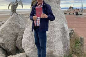 Lindsay Sutton in Morecambe with his new book