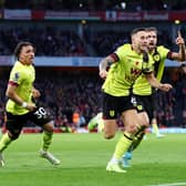 LONDON, ENGLAND - NOVEMBER 11: Josh Brownhill of Burnley celebrates with teammates after scoring the team's first goal during the Premier League match between Arsenal FC and Burnley FC at Emirates Stadium on November 11, 2023 in London, England. (Photo by Marc Atkins/Getty Images)