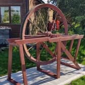 Winding wheel, found in a local scrap yard, is believed to be the smallest of the three wheels shown on original photographs of Woodend Colliery which closed in 1959.