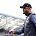 BRIGHTON, ENGLAND - DECEMBER 09: Vincent Kompany, Manager of Burnley, inspects the pitch prior to the Premier League match between Brighton & Hove Albion and Burnley FC at American Express Community Stadium on December 09, 2023 in Brighton, England. (Photo by Bryn Lennon/Getty Images)