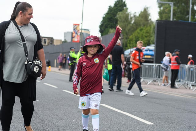 Burnley fans arrive at Turf Moor ahead of the home fixture against Luton Town. Photo: Kelvin Stuttard