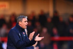 CHELTENHAM, ENGLAND - JANUARY 29:  Michael Duff, manager of Cheltenham issues instructions to his players from the touchline during the Sky Bet League One match between Cheltenham Town and Wigan Athletic at The Jonny-Rocks Stadium on January 29, 2022 in Cheltenham, England. (Photo by Dan Istitene/Getty Images)
