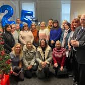 The Freeflow team celebrating 25 years of offering mental health support in Burnley.