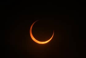 Partial view of the solar annular eclipse in Puerto San Julian, Santa Cruz province, Argentina on October 2, 2024. (Photo by Juan MABROMATA / AFP) (Photo by JUAN MABROMATA/AFP via Getty Images)