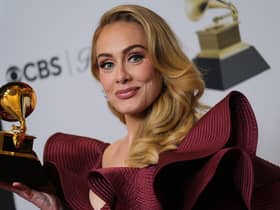 English singer-songwriter Adele poses with the award for Best Pop Solo Performance for Easy on Me in the press room during the 65th Annual Grammy Awards at the Crypto.com Arena in Los Angeles on February 5th, 2023. (Photo by Chris Delmas / AFP) (Photo by CHRIS DELMAS/AFP via Getty Images)