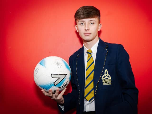 Schoolboy Logan Carlin has signed a two-year scholarship with the club he supports – Burnley FC.