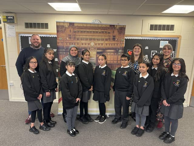 Burnley MP Antony Higginbotham with students who formed their own parliament at Stoneyholme Primary School in Burnley
