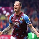 BURNLEY, ENGLAND - MAY 08: Ashley Barnes of Burnley celebrates after scoring the team's second goal during the Sky Bet Championship between Burnley and Cardiff City at Turf Moor on May 08, 2023 in Burnley, England. (Photo by Gareth Copley/Getty Images)