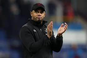 BURNLEY, ENGLAND - FEBRUARY 14: Vincent Kompany, Manager of Burnley, applauds the fans following the Sky Bet Championship match between Burnley and Watford at Turf Moor on February 14, 2023 in Burnley, England. (Photo by Clive Brunskill/Getty Images)
