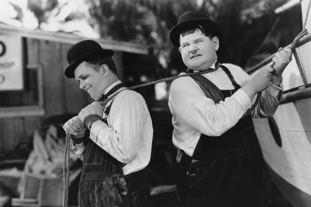Laurel and Hardy in their short film Towed in a Hole
