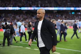 MANCHESTER, ENGLAND - MARCH 18: Vincent Kompany, Manager of Burnley, walks to the team dug out prior to the Emirates FA Cup Quarter Final match between Manchester City and Burnley at Etihad Stadium on March 18, 2023 in Manchester, England. (Photo by Clive Brunskill/Getty Images)