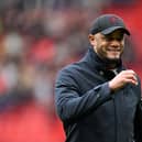 MANCHESTER, ENGLAND - APRIL 27: Vincent Kompany, Manager of Burnley, celebrates following the team's victory in the Premier League match between Manchester United and Burnley FC at Old Trafford on April 27, 2024 in Manchester, England. (Photo by Michael Regan/Getty Images)