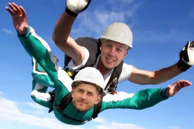 A Kingswood Homes' mock-up image of charity sky dive duo Liam Reilly and Luke Kenyon aiming to support Derian House
