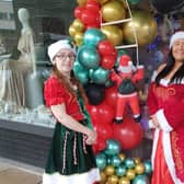 Mrs Clause and the Christmas elf  (aka Sharon Cawse and Paige Anderson) will be handing out free presents for children at the Depher hub in Burnley town centre right up until December 23rd.